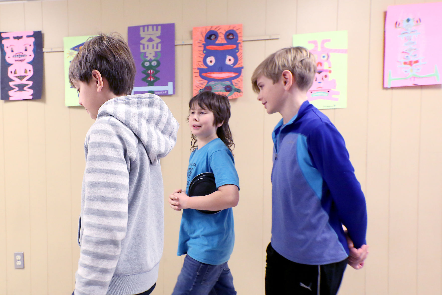 Lincoln students walking in the school hallway